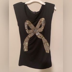 Embellished gold/silver bow shirt.